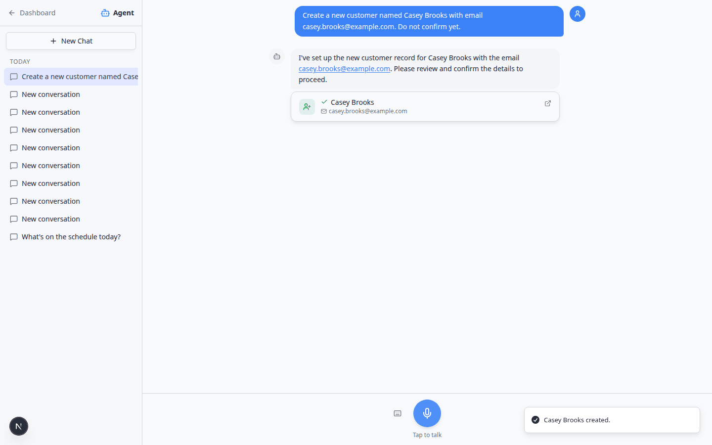 Agent chat after confirming a new customer showing a success card and toast notification that the customer was created