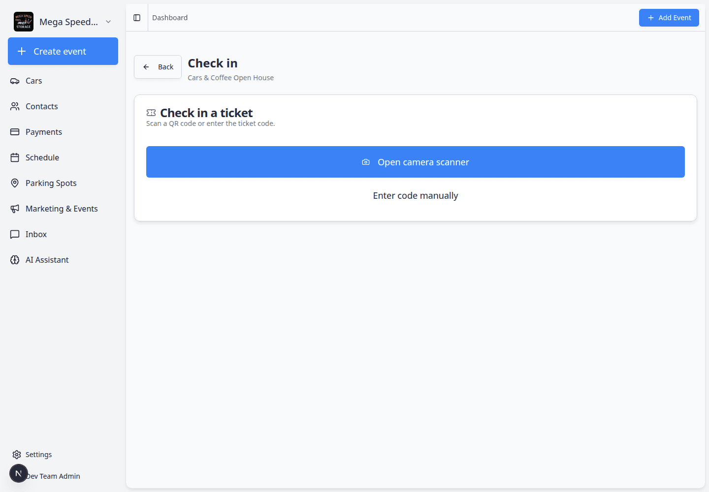 Event check-in page with options to scan a QR code or enter a ticket code manually